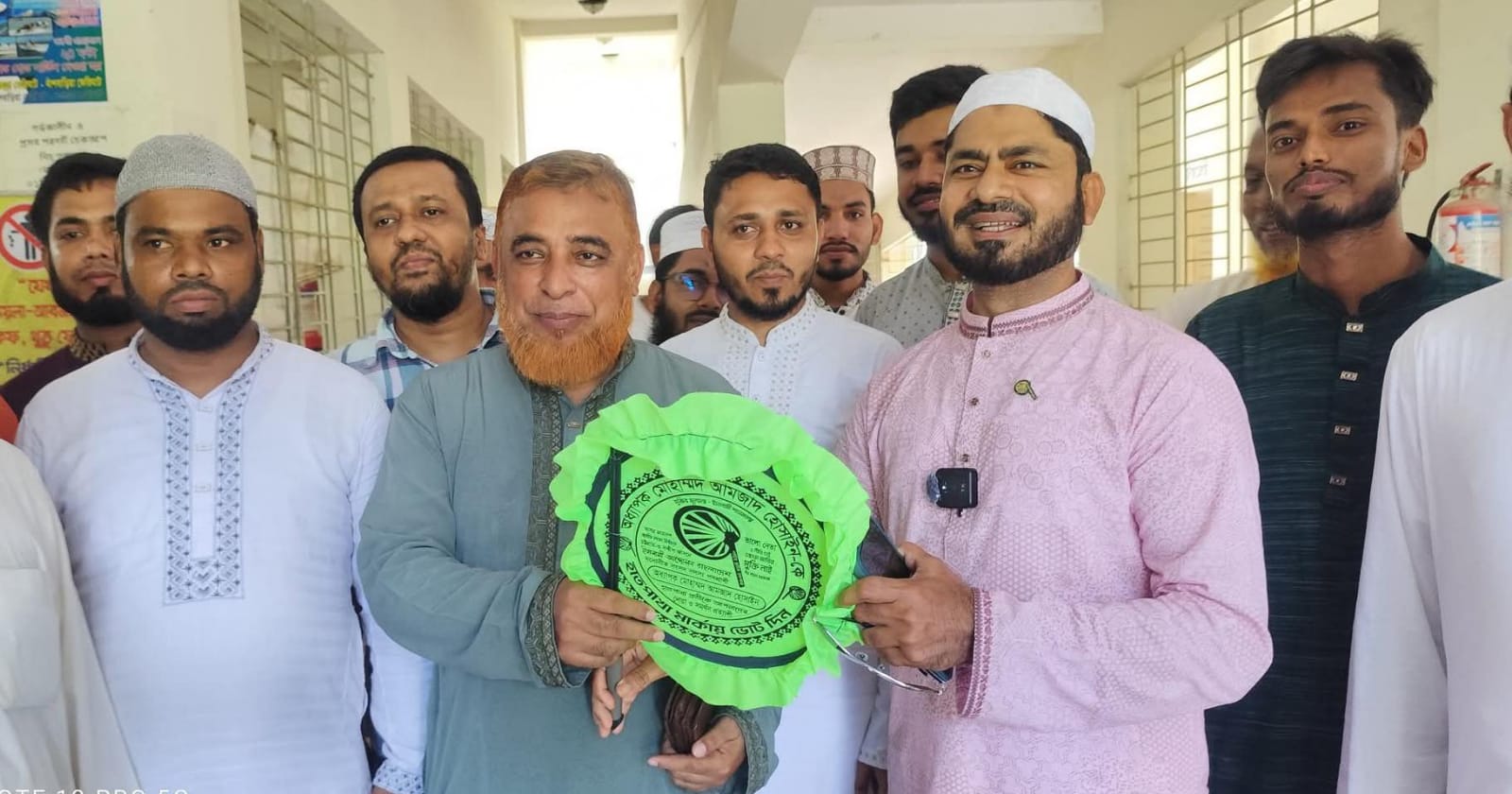 আলাউদ্দিন-আমজাদ ভোটের মাঠে প্রতিযোগিতা, উন্নয়ন মঞ্চে সৌহার্দ্য 
